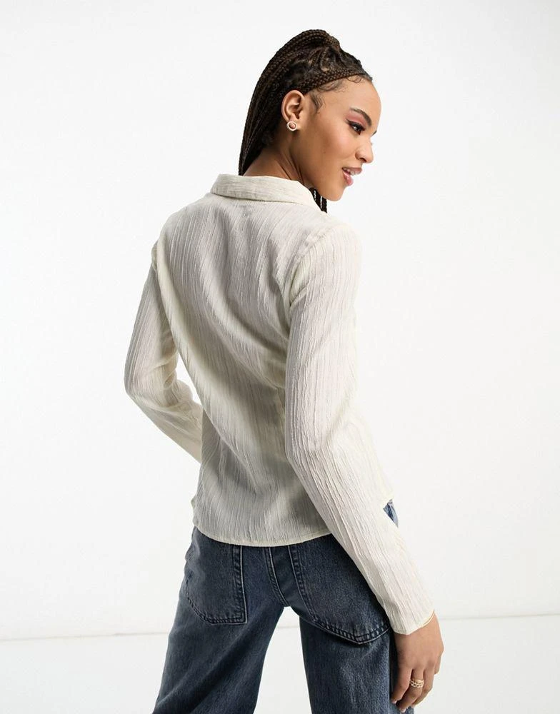 商品Monki|Monki textured hook and eye collared blouse in beige,价格¥231,第2张图片详细描述
