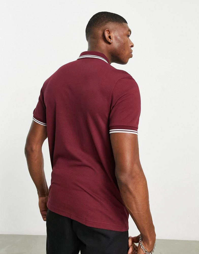 商品Fred Perry|Fred Perry twin tipped logo polo in burgundy,价格¥710,第2张图片详细描述