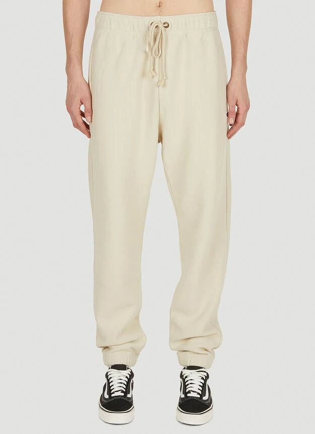 商品CHAMPION|Reverse Weave 1952 Track Pants in Beige,价格¥509,第1张图片