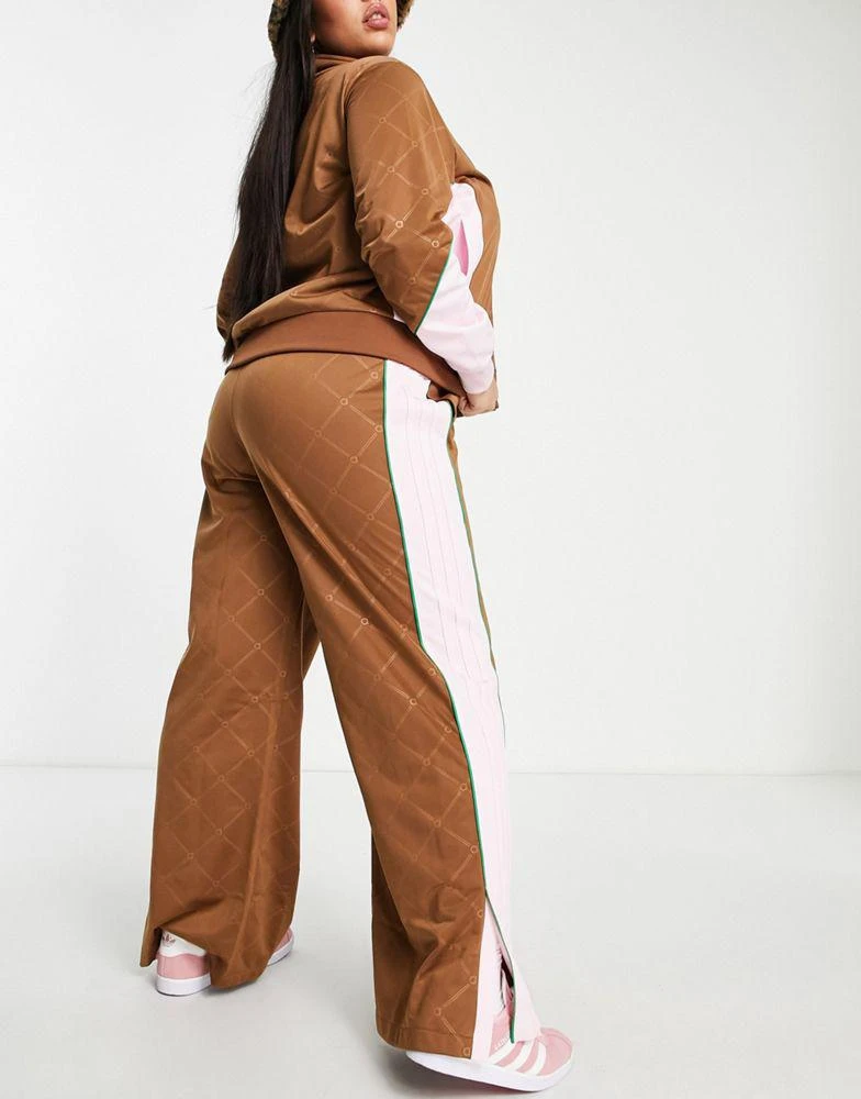 商品Adidas|adidas Originals 'Retro Luxury' Plus wide leg track pant in brown with monogram print,价格¥245,第2张图片详细描述