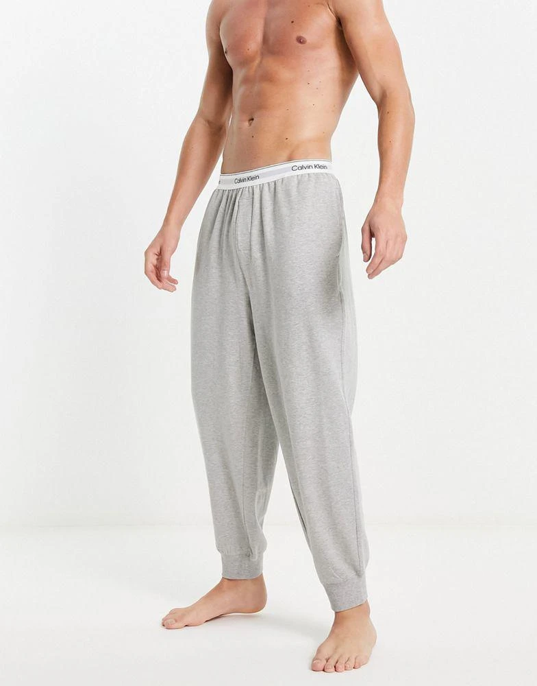 商品Calvin Klein|Calvin Klein lounge jogger in grey with logo waistband,价格¥605,第1张图片