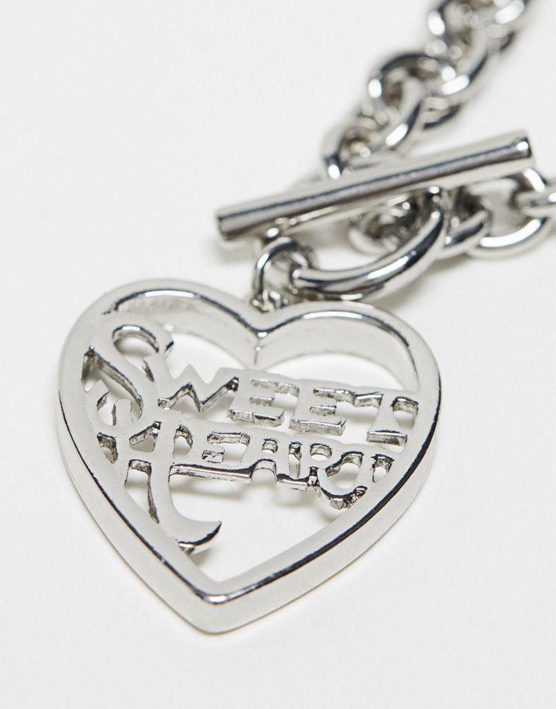 商品Reclaimed Vintage|Reclaimed Vintage t bar necklace with heart in silver,价格¥68,第5张图片详细描述