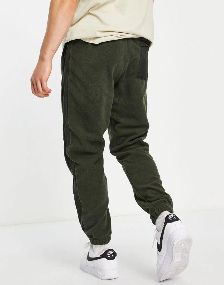 商品NIKE|Nike Sportswear Sport Essentials cuffed polar fleece joggers in khaki,价格¥355,第2张图片详细描述