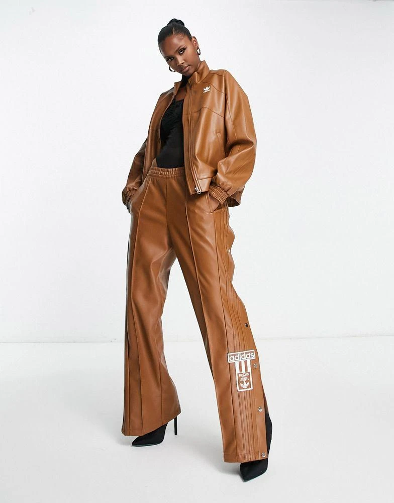 商品Adidas|adidas Originals 'centre stage' faux leather jacket in brown,价格¥944,第1张图片