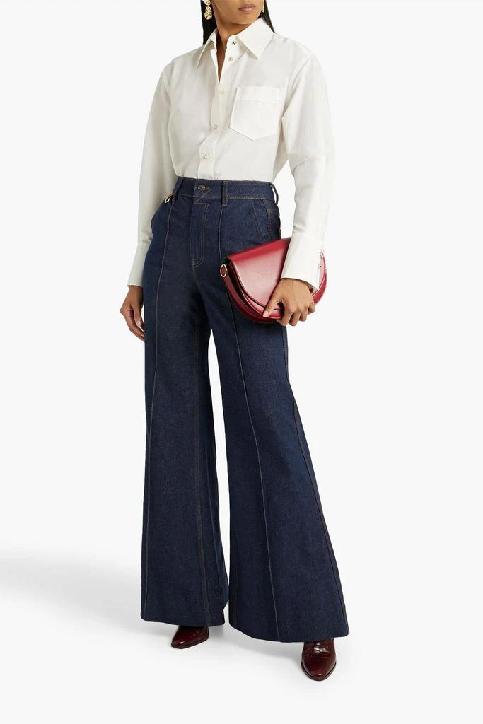 商品Zimmermann|High-rise flared jeans,价格¥1317,第2张图片详细描述