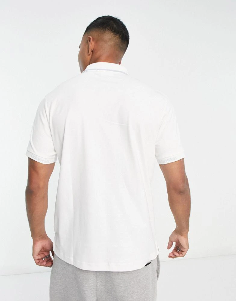 商品Calvin Klein|Calvin Klein logo jacquard polo shirt in white,价格¥464,第2张图片详细描述