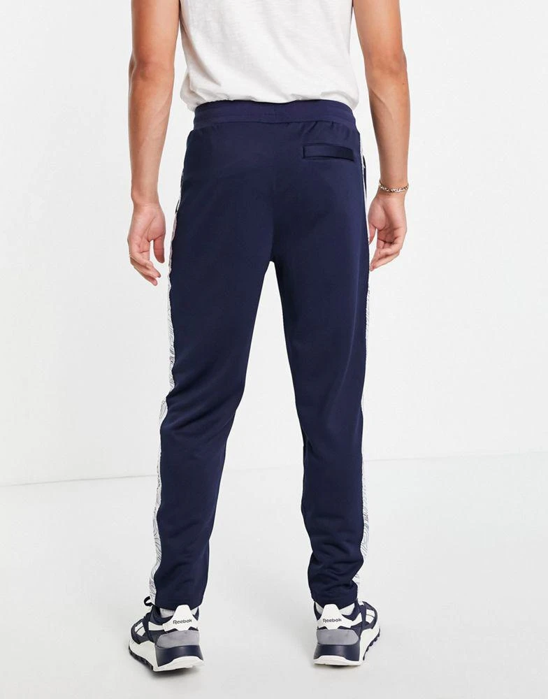 商品Fila|Fila x Call Of Duty Verdansk joggers in navy,价格¥380,第4张图片详细描述