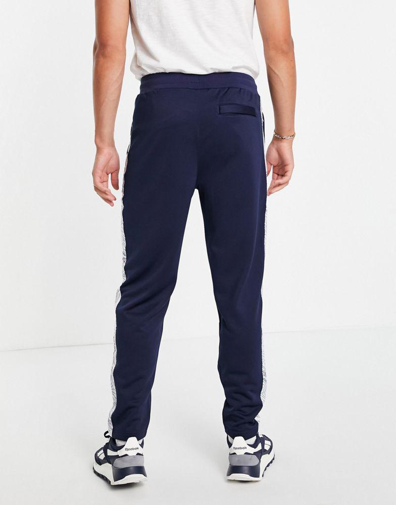 商品Fila|Fila x Call Of Duty Verdansk joggers in navy,价格¥371,第6张图片详细描述