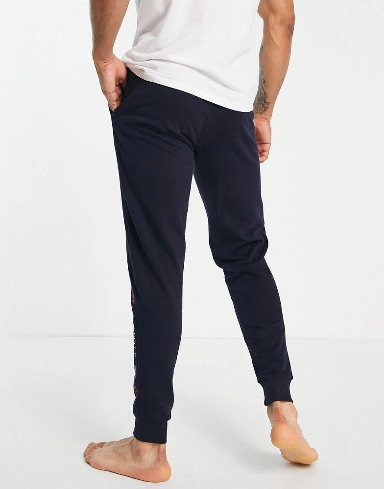 商品Tommy Hilfiger|Tommy Hilfiger loungewear joggers in navy co-ord,价格¥638,第2张图片详细描述