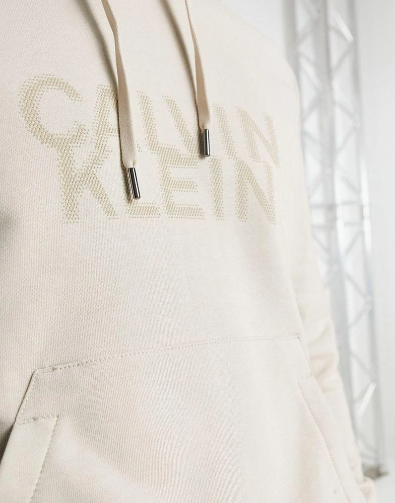 商品Calvin Klein|Calvin Klein distorted logo cotton blend hoodie in stone,价格¥665,第3张图片详细描述