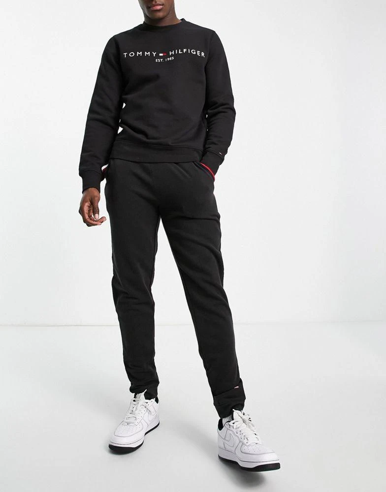 商品Tommy Hilfiger|Tommy Hilfiger lounge flag joggers in black,价格¥644,第1张图片