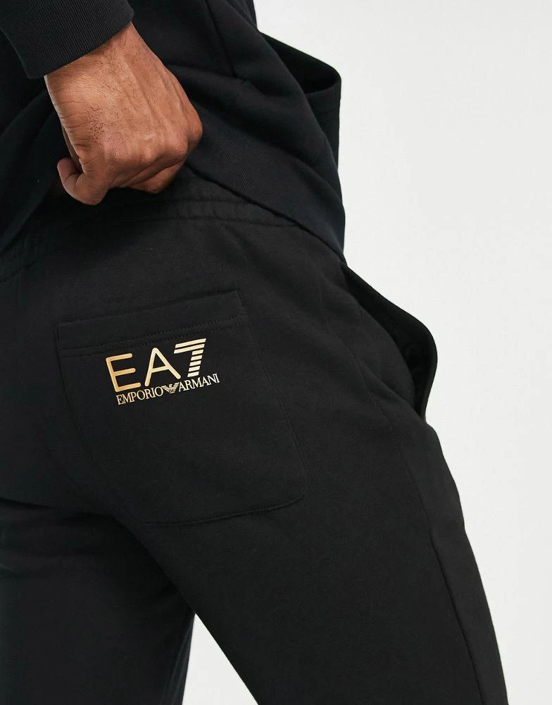 商品EA7|Armani EA7 large gold side logo joggers in black,价格¥512,第3张图片详细描述