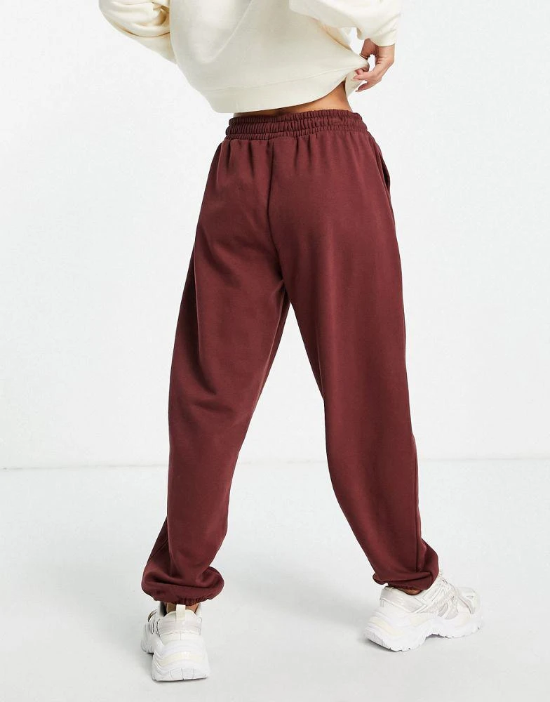 商品Fila|Fila oversized joggers with tonal branding in red,价格¥411,第2张图片详细描述