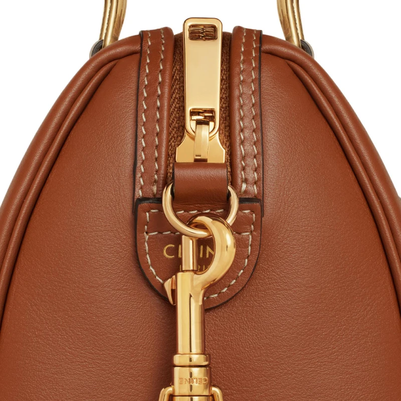 商品[国内直发] Celine|赛琳 Triomphe 凯旋门标志可拆卸可调节肩带 光滑牛皮革 波士顿包单肩斜挎手提包 小号 女款 黄褐色,价格¥14513,第5张图片详细描述