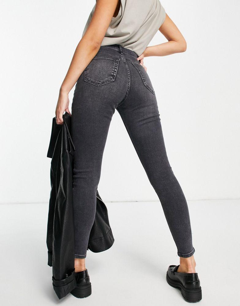 The Kript relaxed jeans in blue denim with contrast print