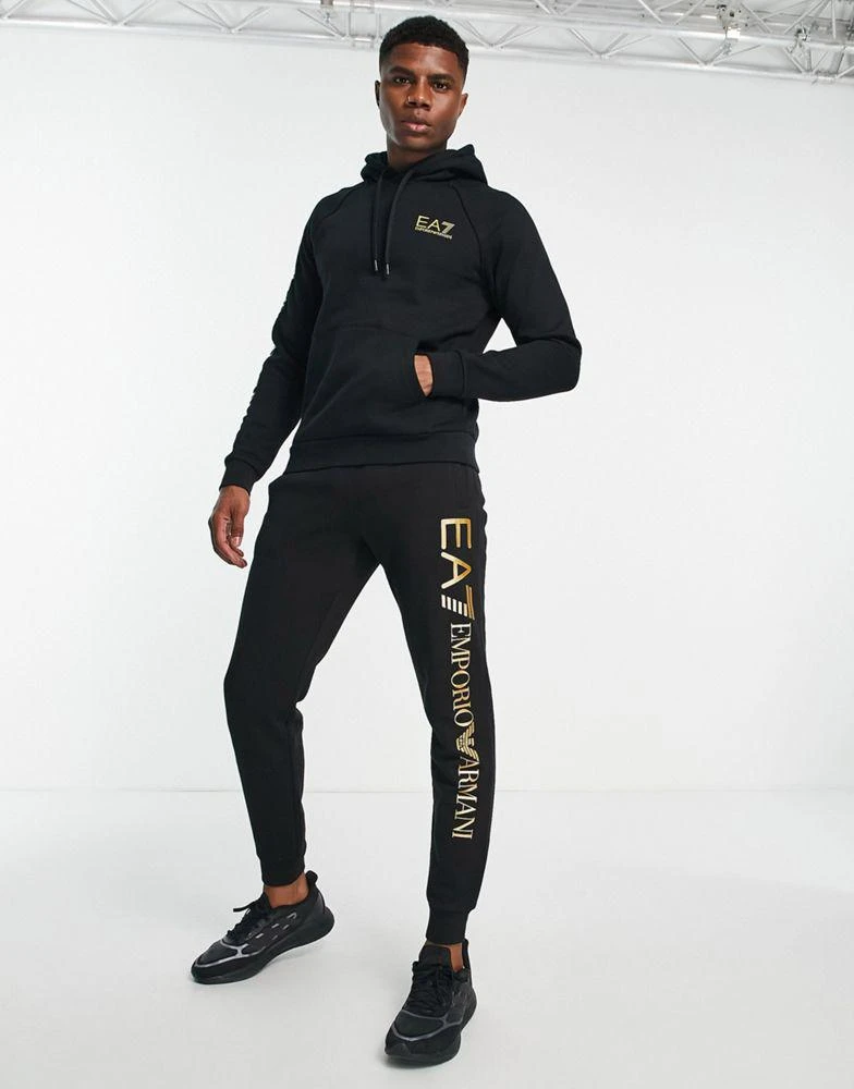 商品EA7|Armani EA7 large gold side logo joggers in black,价格¥512,第4张图片详细描述