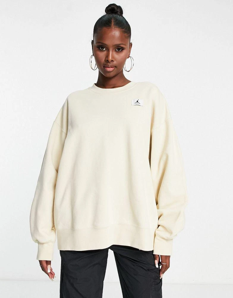 商品Jordan|Jordan Flight fleece sweatshirt in beach beige,价格¥732,第1张图片