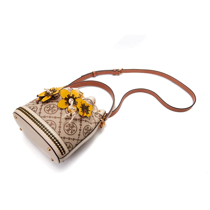 TORY BURCH 汤丽柏琦 T Monogram 经典编织花卉老花满印 皮革 水桶包单肩包手提包 女款 榛子棕 商品