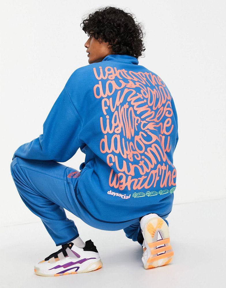 ASOS Daysocial co-ord oversized quarter zip sweatshirt in polar fleece with back graphic print in blue商品第1张图片规格展示