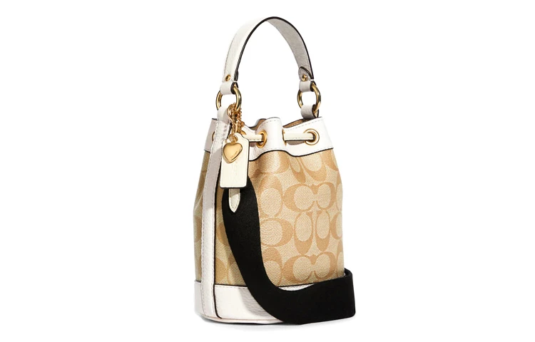 商品[国内直发] Coach|蔻驰 Dempsey 15 经典老花爱心吊坠抽绳开合 涂层帆布拼皮革 水桶包单肩斜挎手提包 小号 女款 卡其白色,价格¥5176,第3张图片详细描述