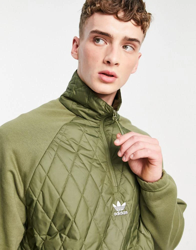 商品Adidas|adidas Originals adicolor quilted 1/4 zip jacket in khaki,价格¥310,第3张图片详细描述