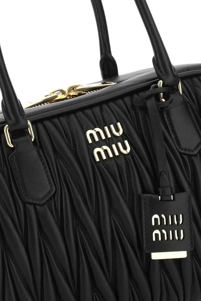 商品Miu Miu|Miu Miu Matelassé Logo Plaque Zipped Tote Bag,价格¥17418,第4张图片详细描述