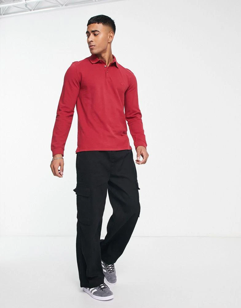 商品Wrangler|Wrangler long sleeve polo in red,价格¥273,第4张图片详细描述