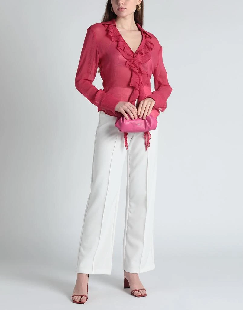 商品BLUMARINE|Solid color shirts & blouses,价格¥1893,第2张图片详细描述