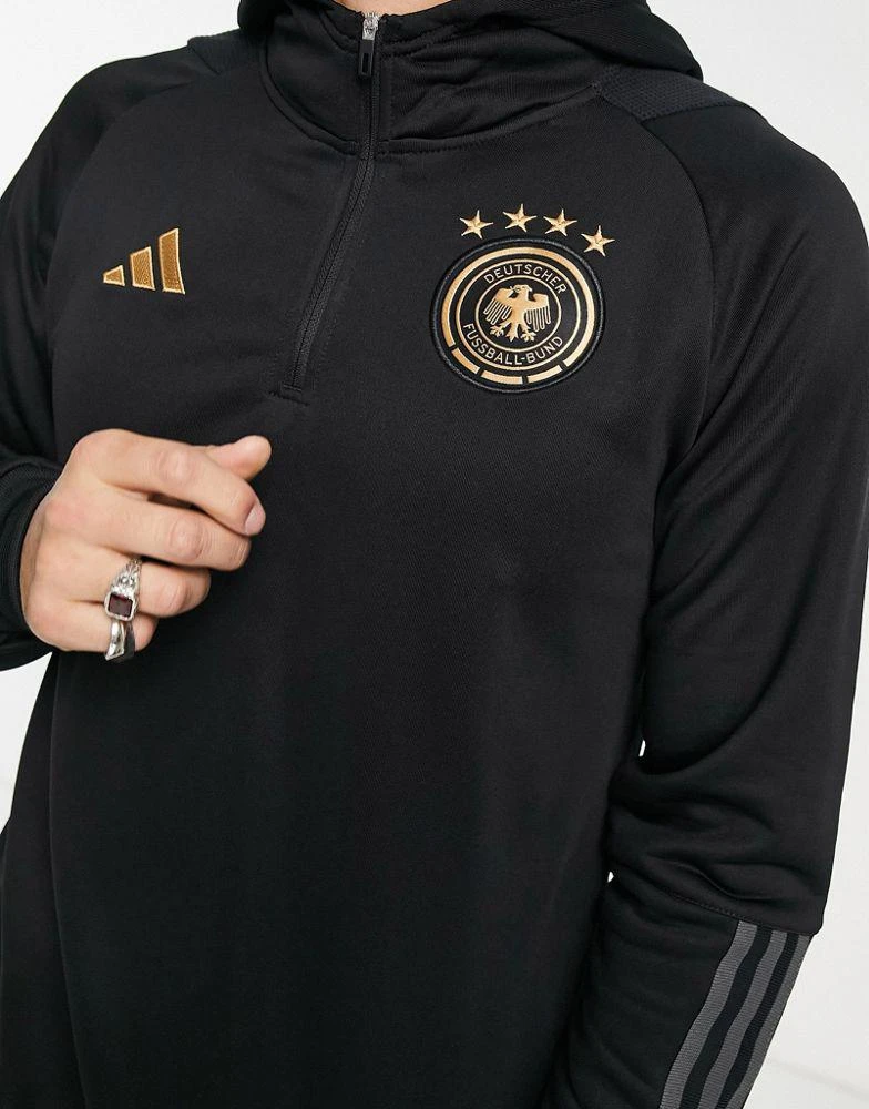 商品Adidas|adidas Football Germany World Cup 2022 off-pitch 3 stripe 1/4 zip hoodie in black,价格¥536,第2张图片详细描述