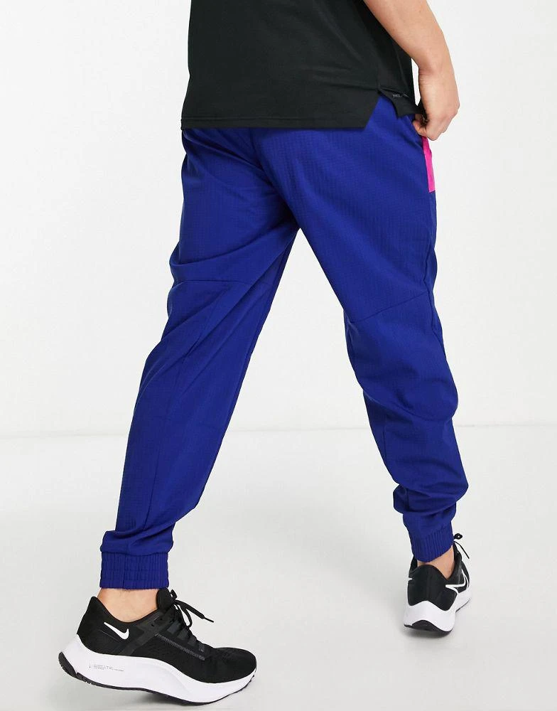 商品NIKE|Nike Training Sport Clash Di-Fit woven joggers in royal blue,价格¥249,第2张图片详细描述