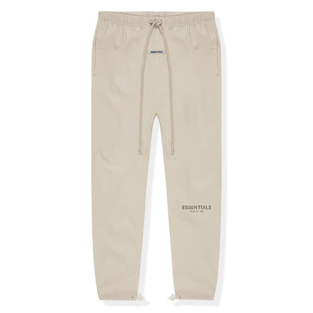 商品Essentials|Fear Of God Essentials Olive/Khaki Reflective Nylon Track Pants,价格¥2083,第1张图片