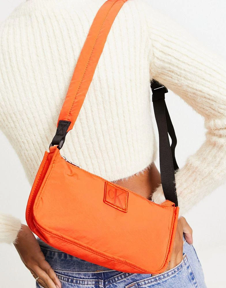 商品Calvin Klein|Calvin Klein Jeans city nylon shoulder bag in coral orange,价格¥397,第1张图片