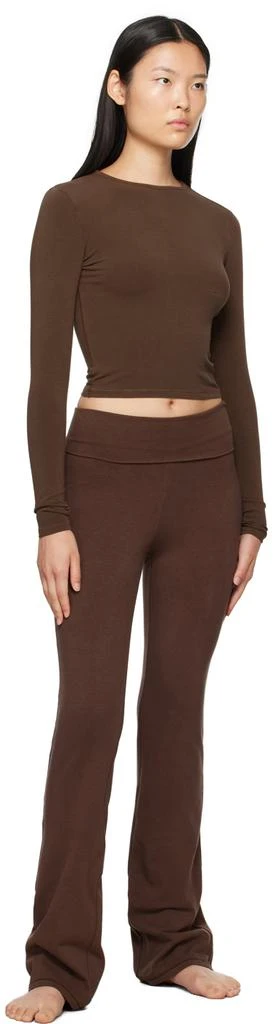 商品SKIMS|Brown Outdoor Foldover Bootcut Leggings,价格¥371,第4张图片详细描述