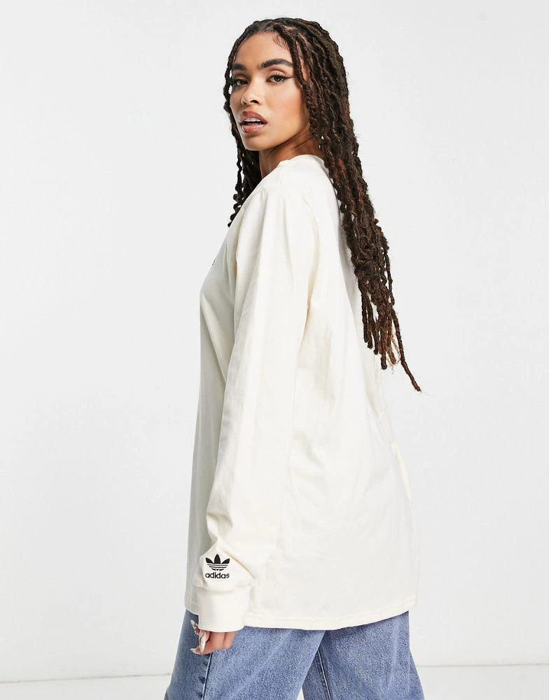 商品Adidas|adidas Originals graphic trefoil long sleeve t-shirt in off white,价格¥257,第2张图片详细描述