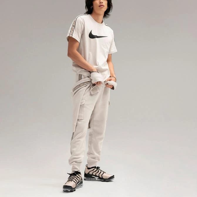 商品NIKE|Nike Sportswear Repeat Tape Fleece Cargo Jogger Pants,价格¥149,第1张图片