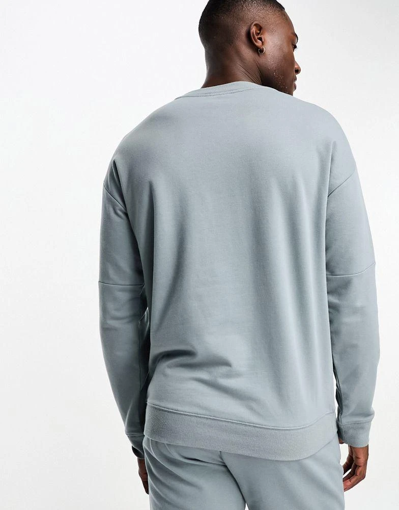 商品Calvin Klein|Calvin Klein sleep sweatshirt in blue,价格¥374,第2张图片详细描述