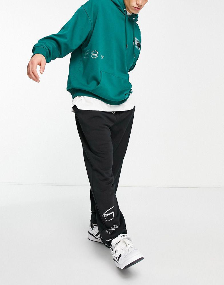 商品Tommy Hilfiger|Tommy Jeans Metallic capsule flag and leg print joggers in black,价格¥428,第5张图片详细描述