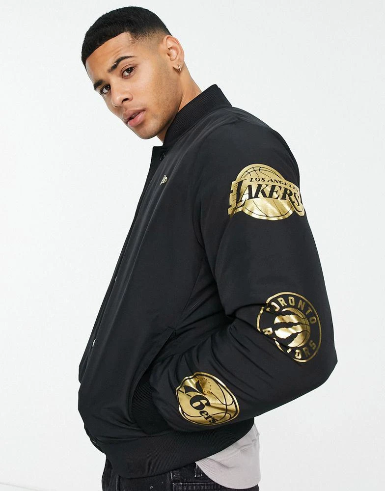 商品New Era|New Era NBA gold foil sleeve printed bomber jacket in black,价格¥697,第1张图片