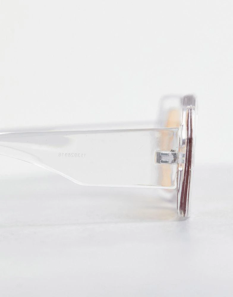 商品ASOS|ASOS DESIGN oversized retro sunglasses in crystal frame with coloured lens  - CLEAR,价格¥47,第2张图片详细描述