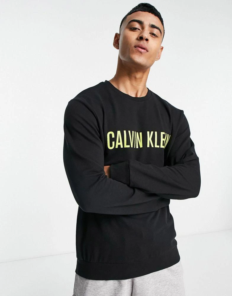 商品Calvin Klein|Calvin Klein Intense Power lounge sweatshirt in black,价格¥344,第1张图片