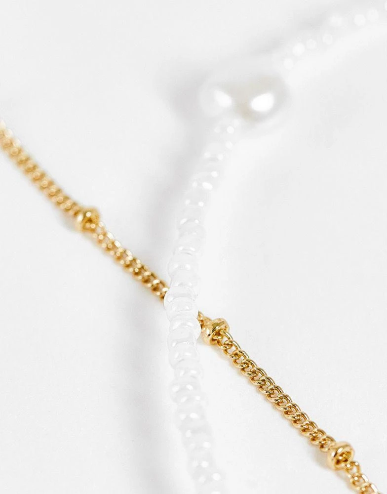 商品ASOS|ASOS DESIGN Curve pack of 2 bracelet with micro faux pearl and dot dash chain in gold tone,价格¥57,第3张图片详细描述