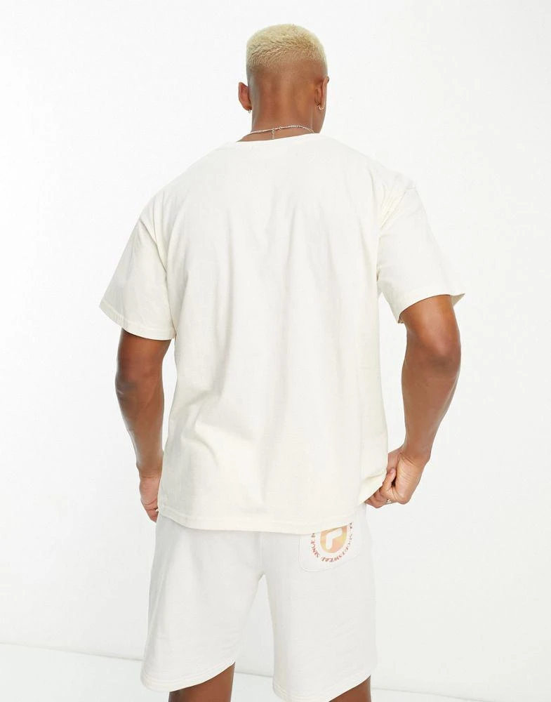 商品Fila|Fila Gordon t-shirt with retro back print in off white,价格¥144,第2张图片详细描述