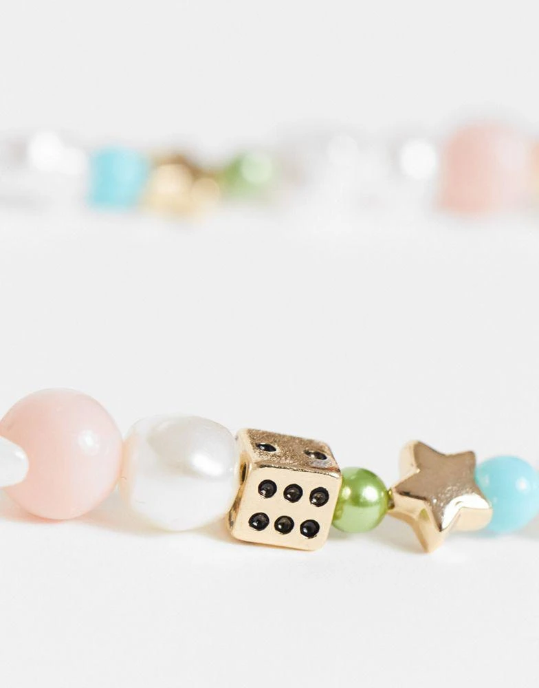 商品ASOS|ASOS DESIGN bead necklace with dice and happy face charm in pastel colours,价格¥37,第4张图片详细描述