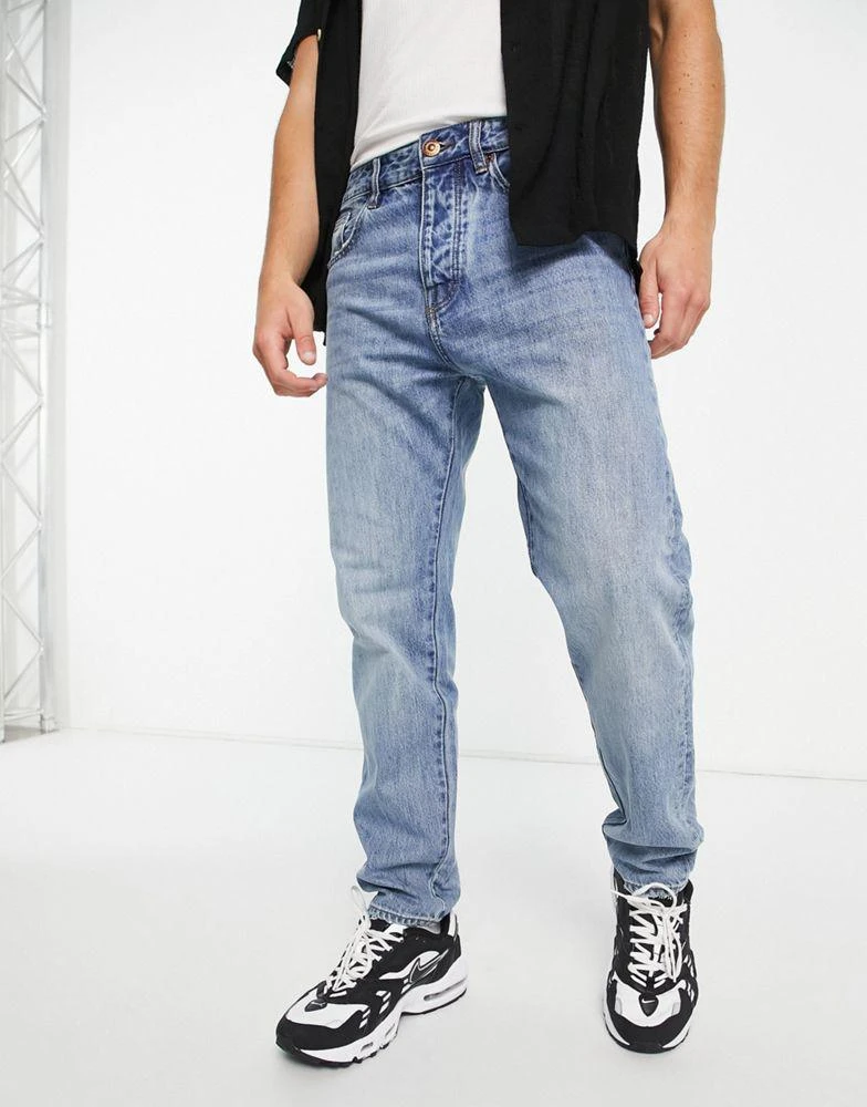 商品Armani Exchange|Armani Exchange tapered jeans in light wash blue,价格¥595,第1张图片