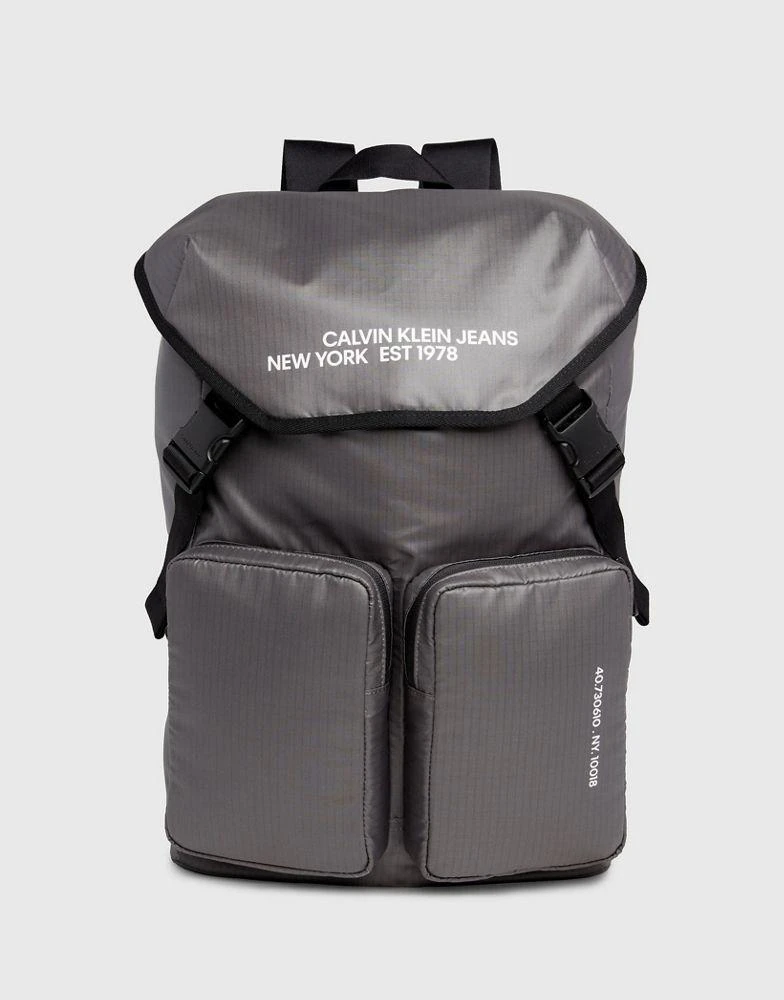 商品Calvin Klein|Calvin Klein Flap Backpack in grey,价格¥1104,第1张图片