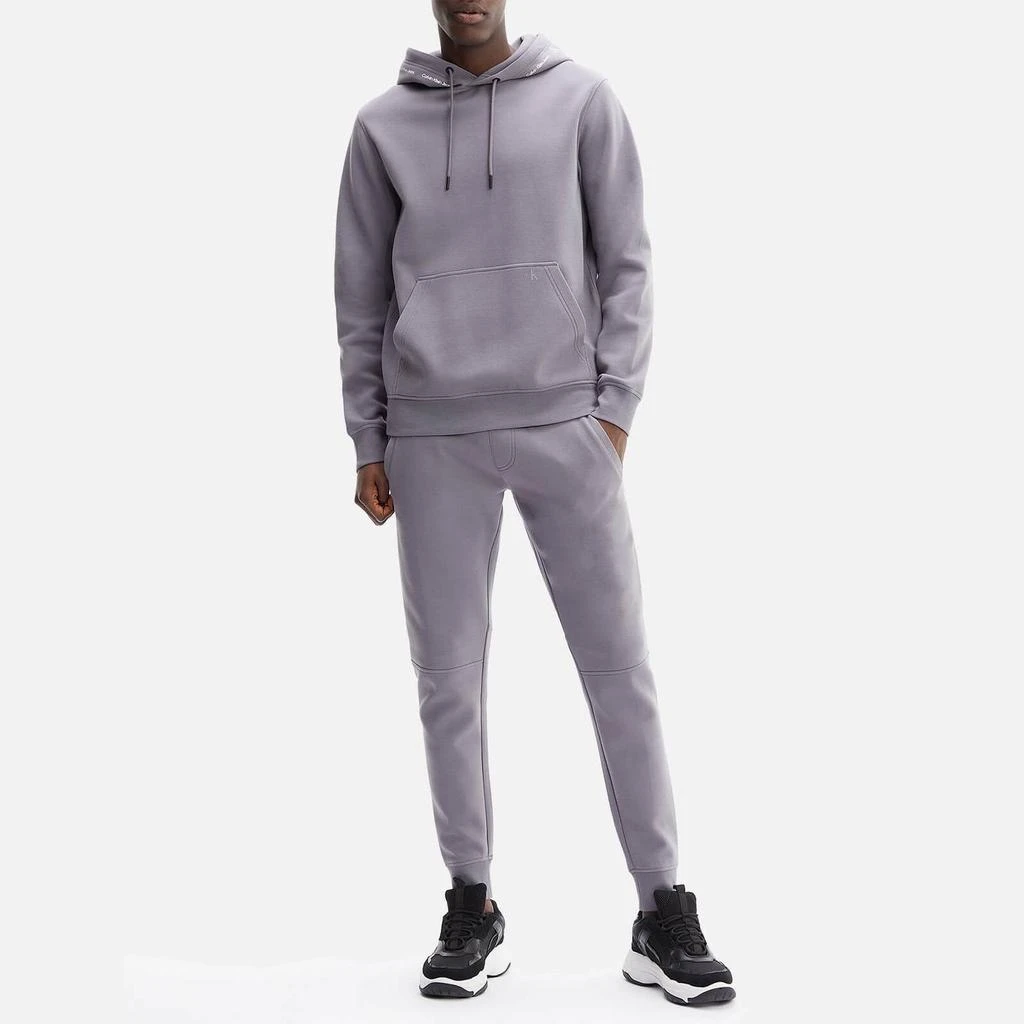 商品Calvin Klein|Calvin Klein Jeans Men's Repeat Logo Hoodie - Fossil Grey,价格¥452,第2张图片详细描述