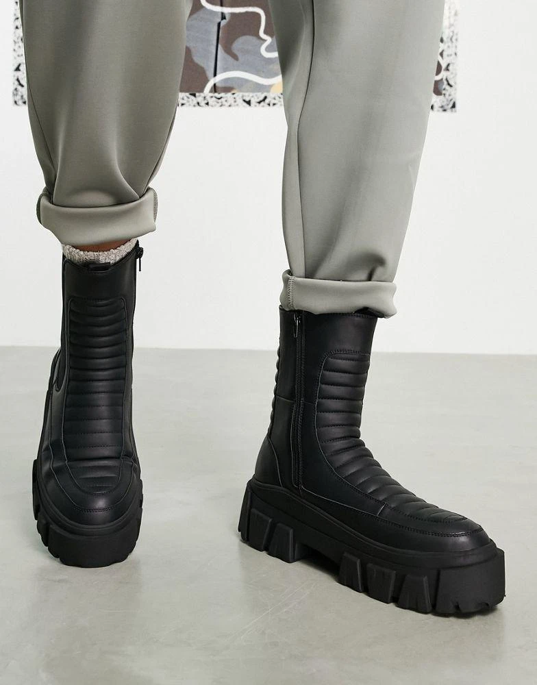 商品ASOS|ASOS DESIGN chelsea calf boots on chunky sole in black faux leather with padded detail,价格¥337,第4张图片详细描述