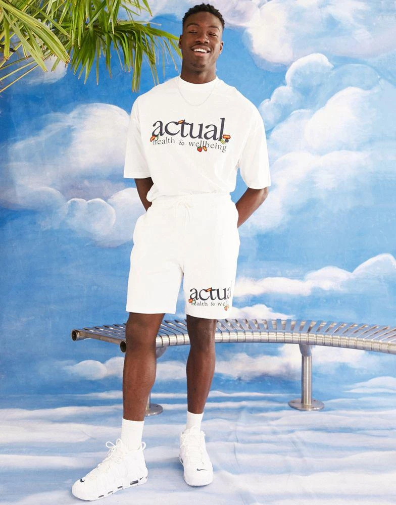 商品ASOS|ASOS Actual co-ord relaxed short with actual health & wellbeing sticker print in ecru,价格¥153,第4张图片详细描述