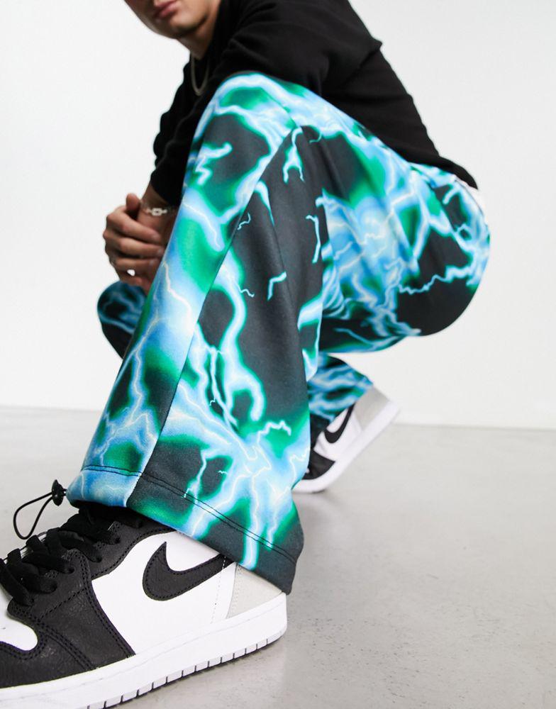 ASOS DESIGN oversized parachute joggers in lightning all over print商品第2张图片规格展示