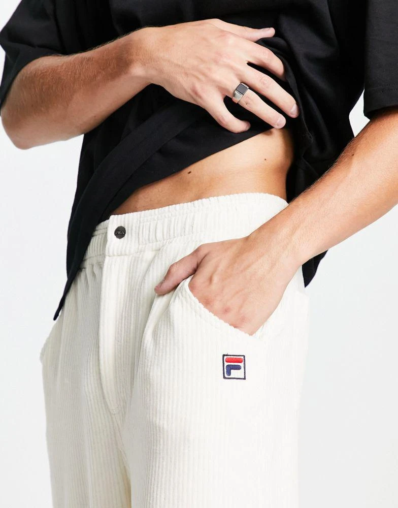 商品Fila|Fila corduroy joggers with logo in ecru,价格¥583,第3张图片详细描述